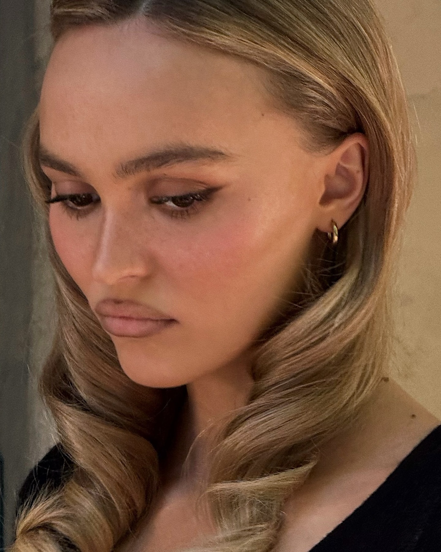 Lily Rose-Depp with lip liner