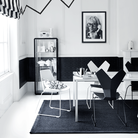room with white and black designed wall frame on wall