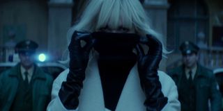 Charlize Theron wears a mask in Atomic Blonde