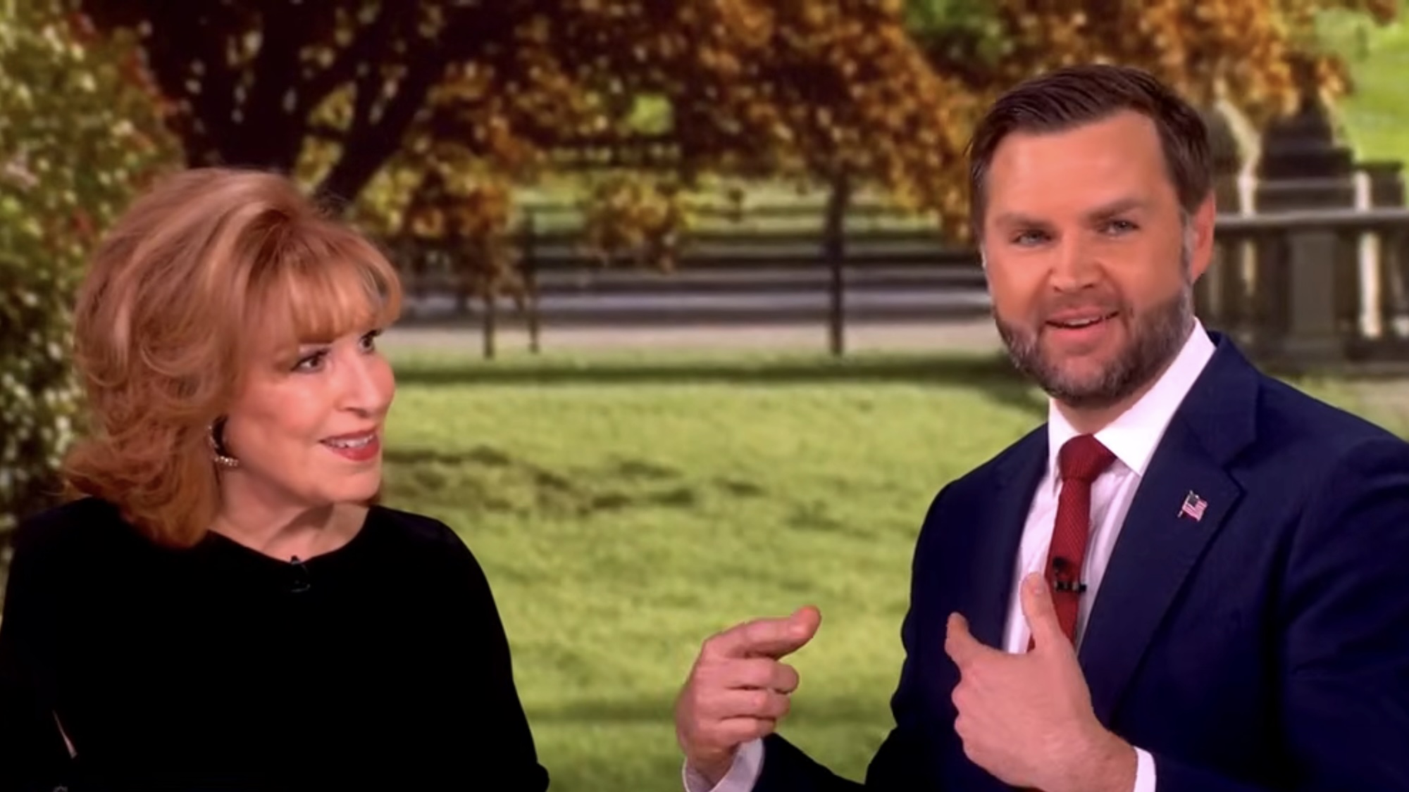 J.D. Vance answering Joy Behar's question while pointing to himself in The View