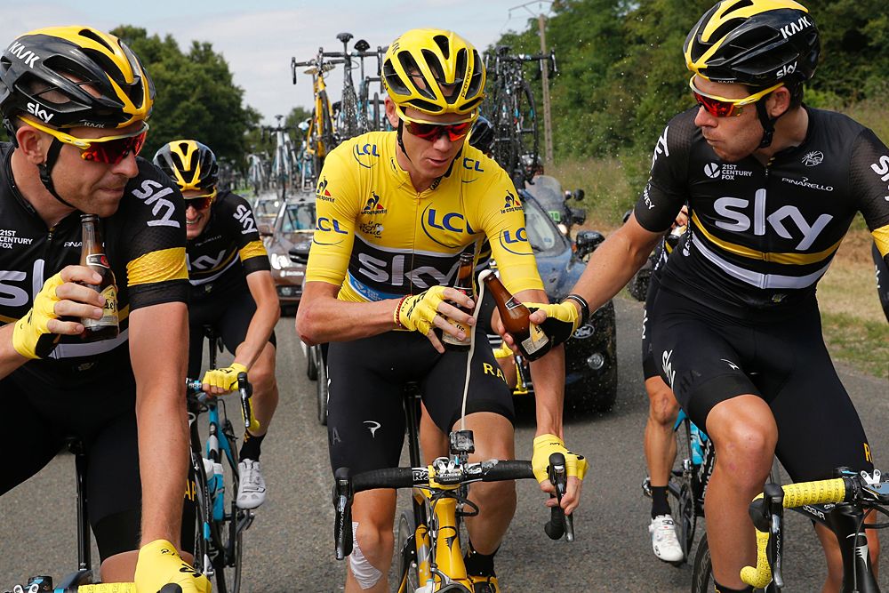 Chris Froome celebrates with his Team Sky teammates on the final Tour de France stage