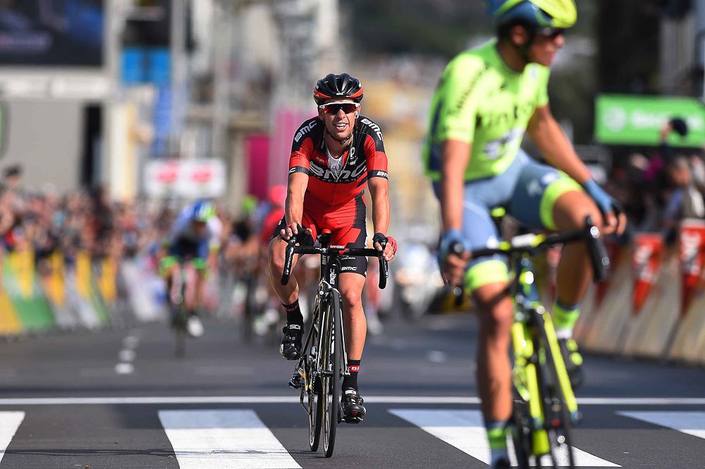 Richie Porte arrives at the finish of Paris-Nice behind Alberto Contador