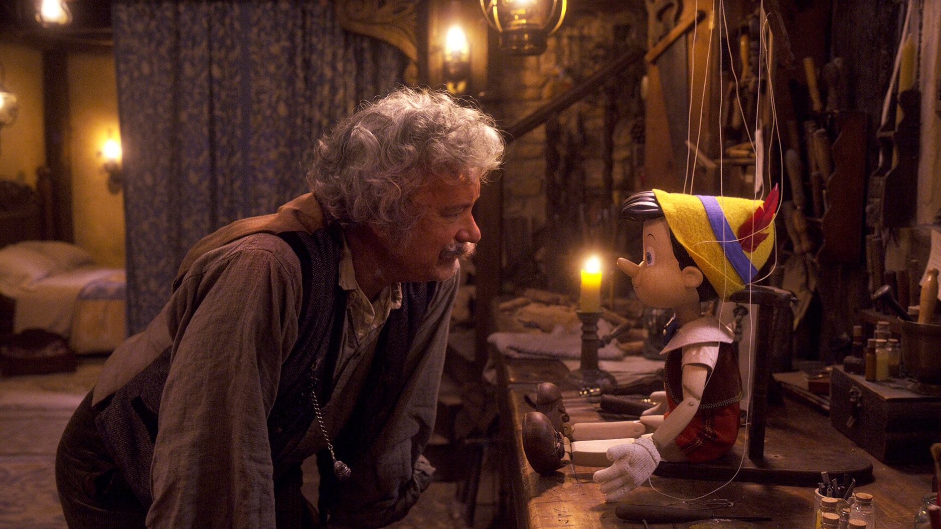 Tom Hanks as Geppetto with Pinocchio in the live action Pinocchio movie