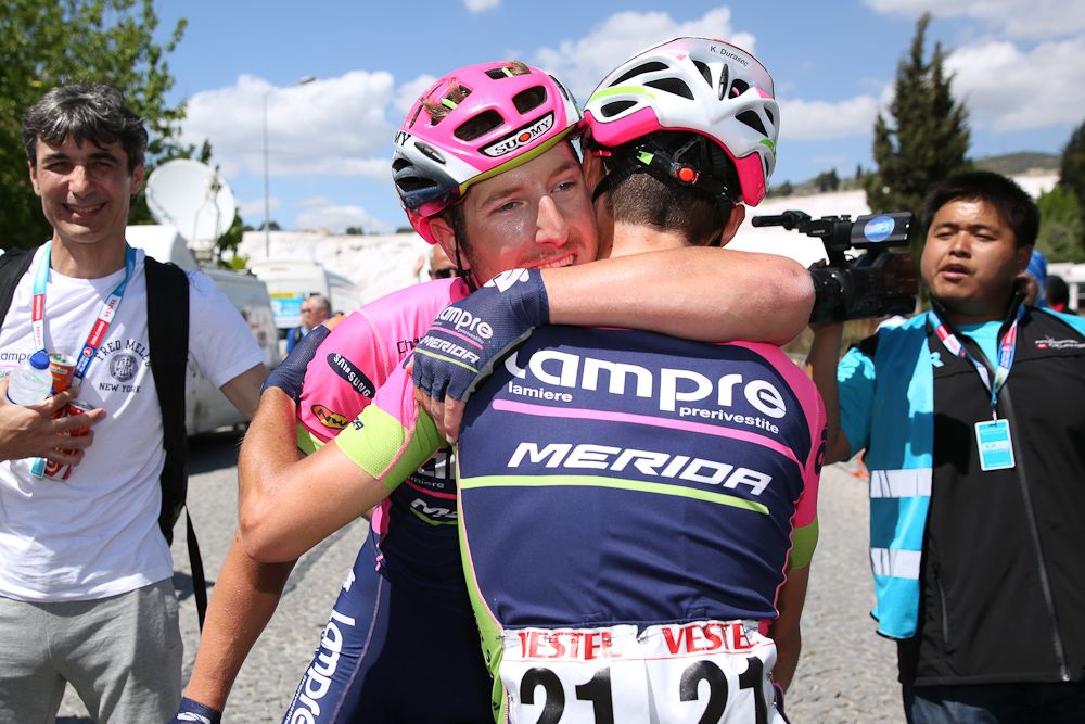 Modolo is congratulated by a Lampre-Merida teammate.