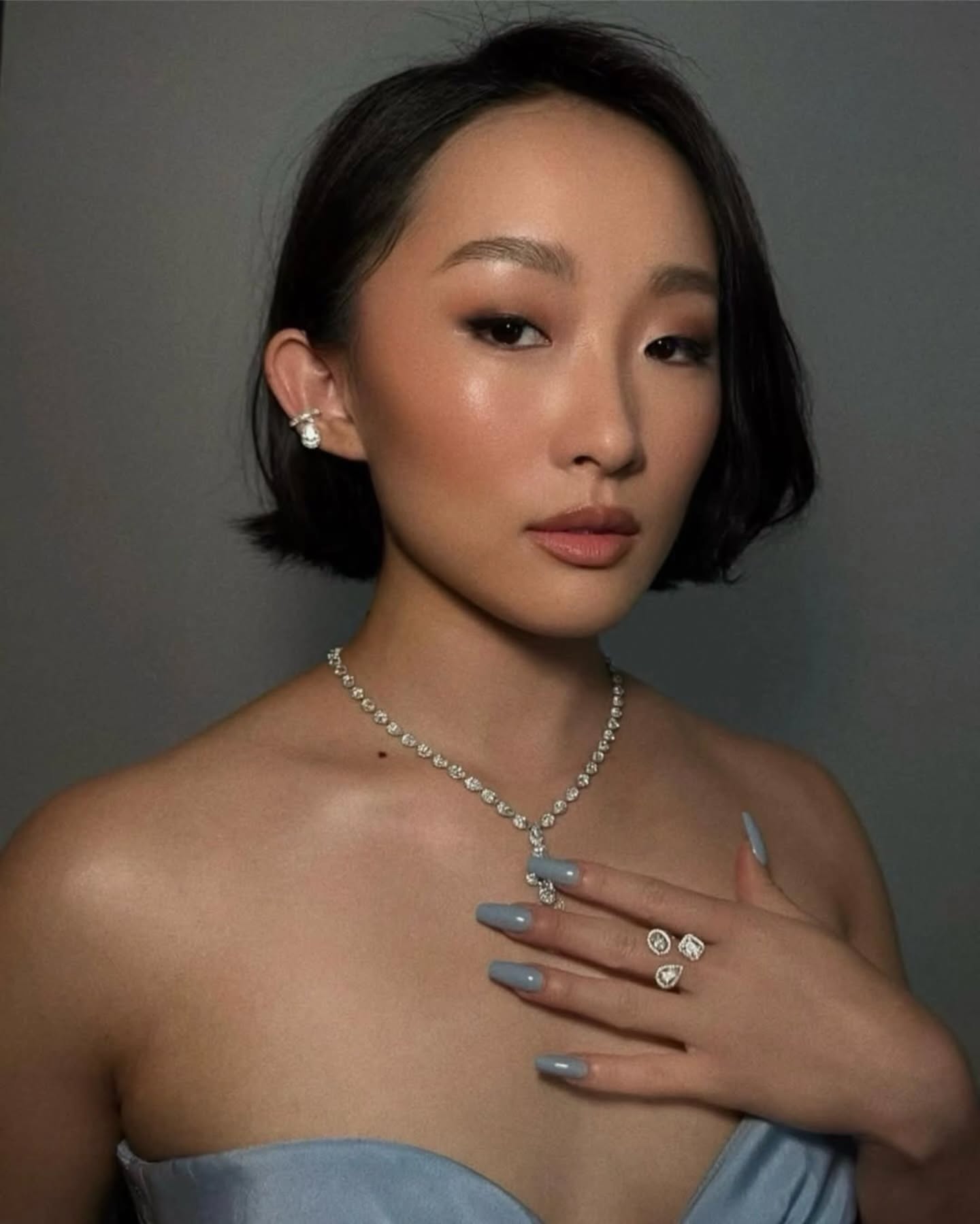 Ji-young Yoo with an icy blue manicure.