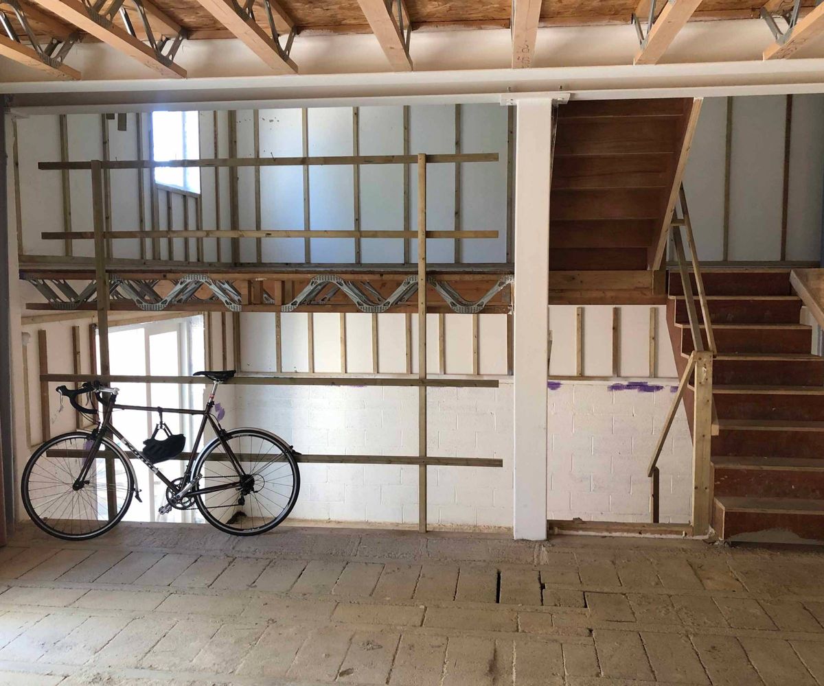 inside constructed house with an empty shell interior