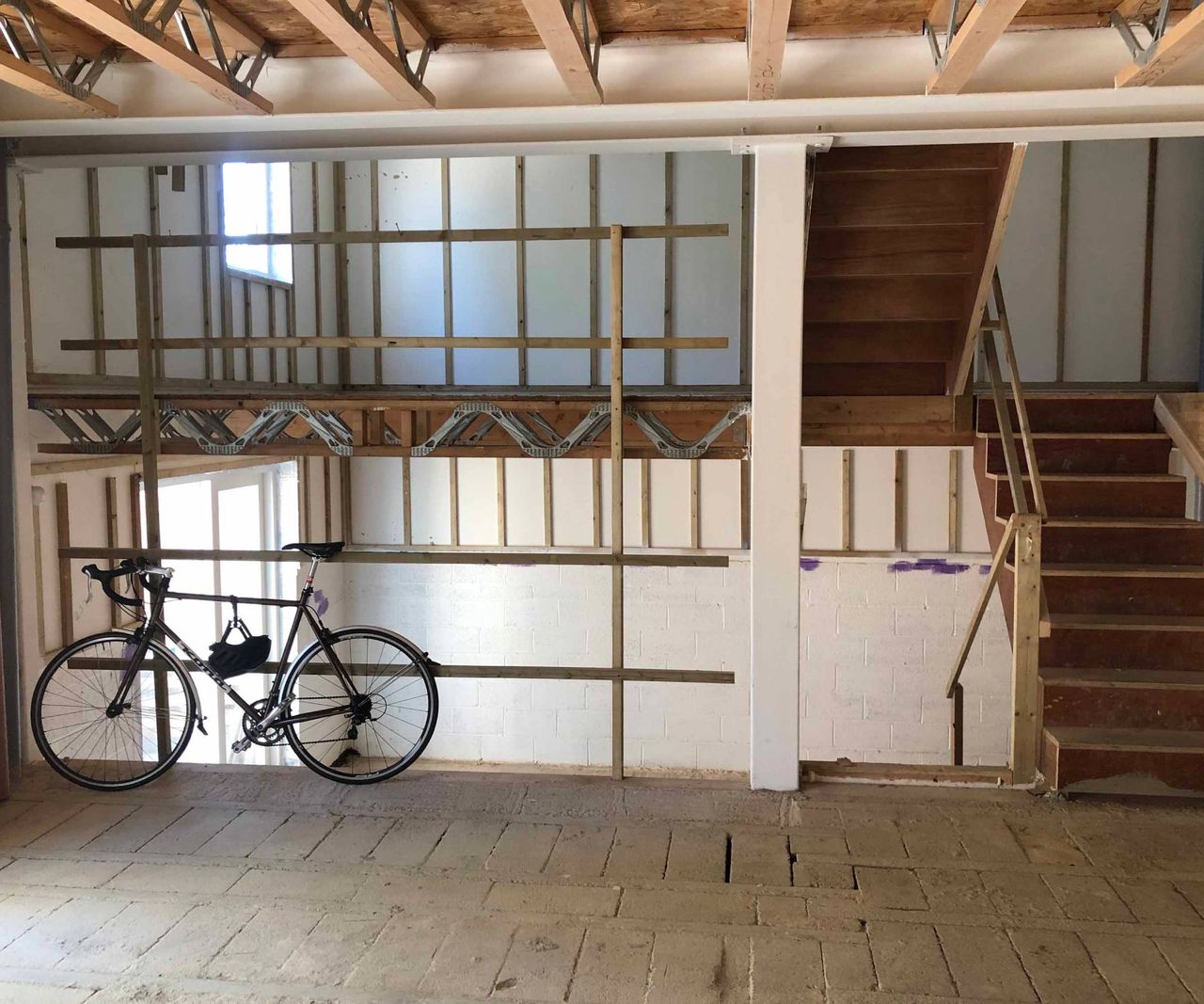 inside constructed house with an empty shell interior