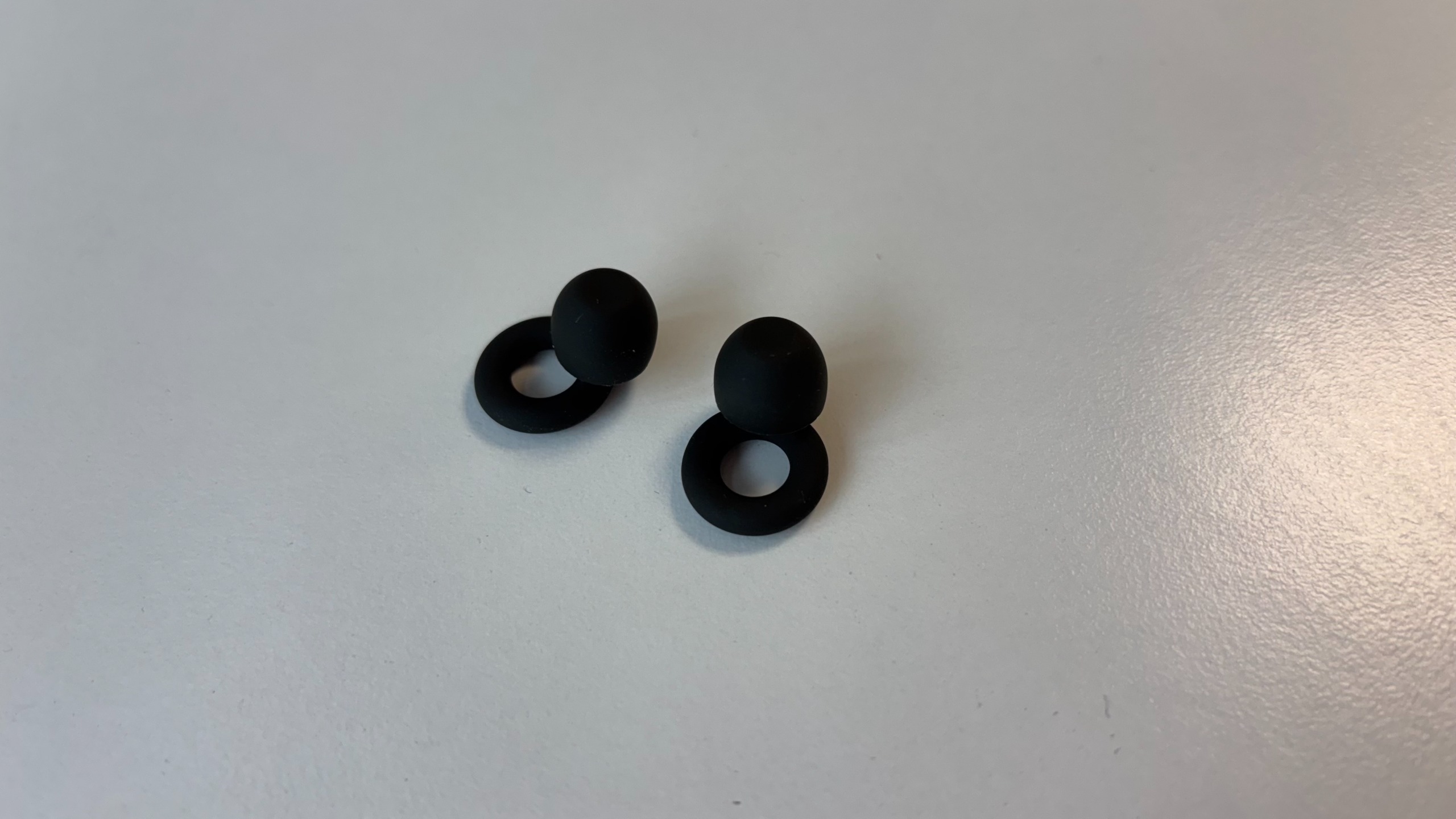 Loop Quiet 2 Earplugs on a white table.