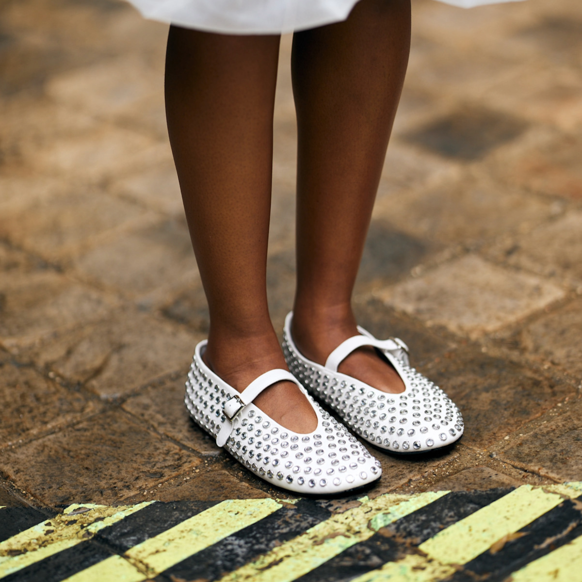 woman wearing white flats 