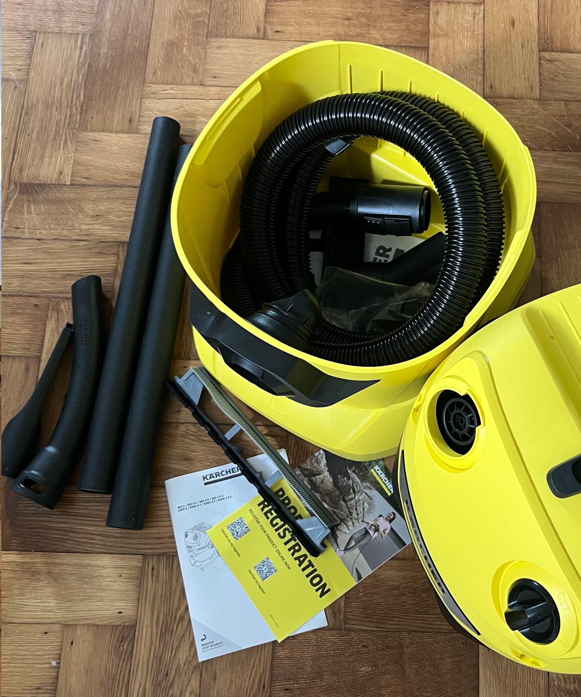 Karcher WD4 comes with a 7.5 ft. (2.2m) suction hose, (2x) 1.8 ft. (0.5m) suction tubes, hand nozzle, crevice nozzle, a wet/dry floor nozzle, automotive style pleated filter, and a fleece filter bag.