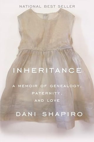 Inheritance book cover with a photo of a small little girl's dress