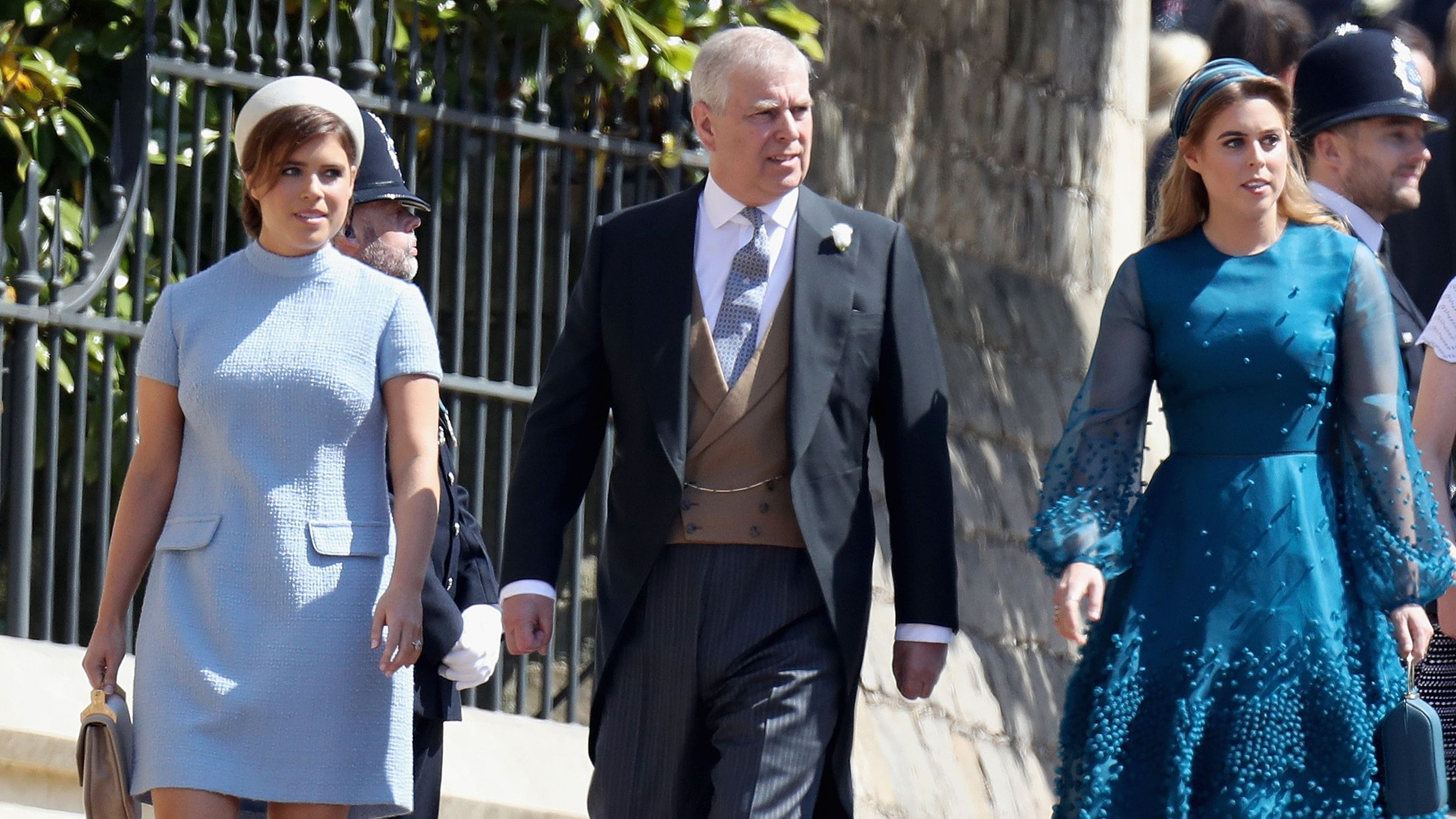Prince Andrew and his daughters Britain&#039;s Princess Eugenie and Princess Beatrice arrive for Harry and Meghan&#039;s wedding
