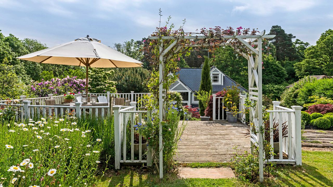 parasol and archway over decking