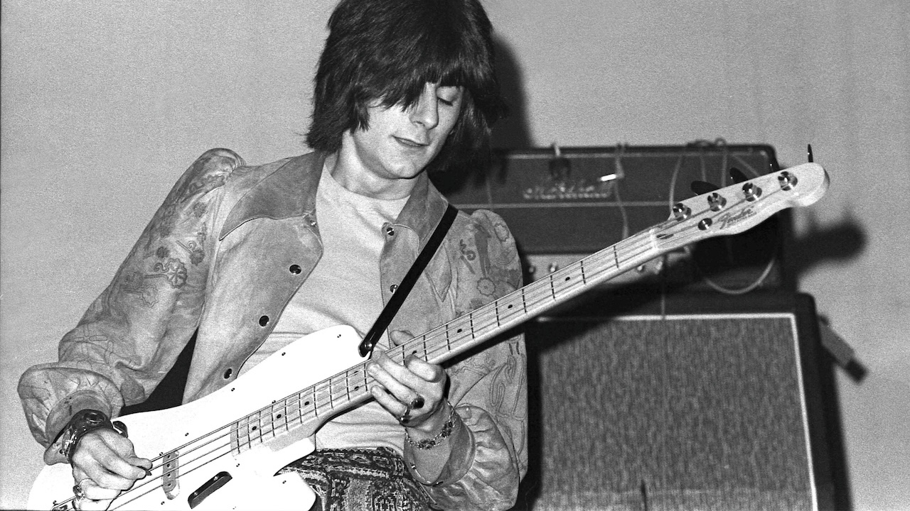 Photo of Ron WOOD and JEFF BECK GROUP and Ronnie WOOD; Ron Wood performing live onstage with the Jeff Beck Group, playing bass at the Shrine Auditorium