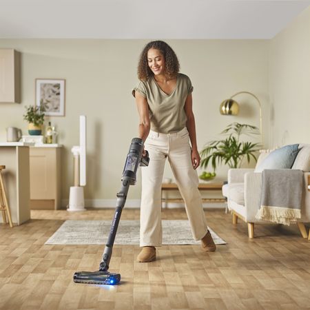 Woman hoovering floor