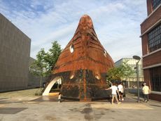 Temp’L by South Korean architectural practice Shinslab. Artistic structure made from the recycled steel parts of an old ship.
