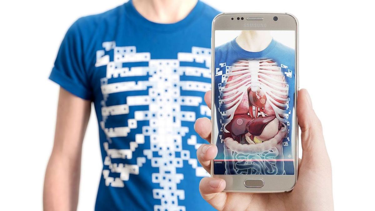 Cell phone displays skeleton and organs of chest and abdomen .