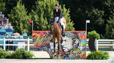 Ben Maher and Dallas Vegas Batilly jump clear in round one of the Paris 2024 Olympic showjumping team competition.