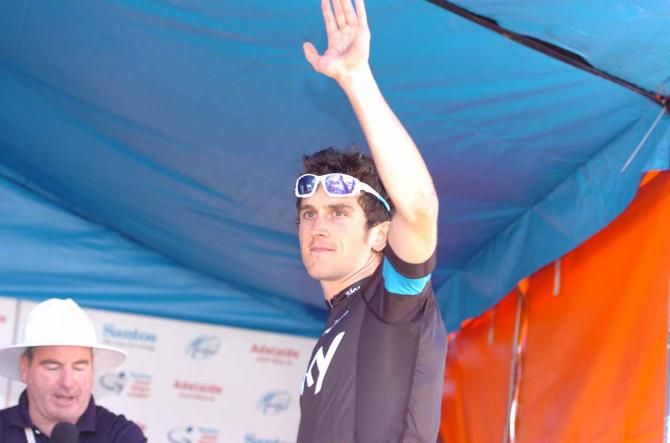 Geraint Thomas (Sky) salutes from the podium.