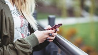 girl with phone in hand