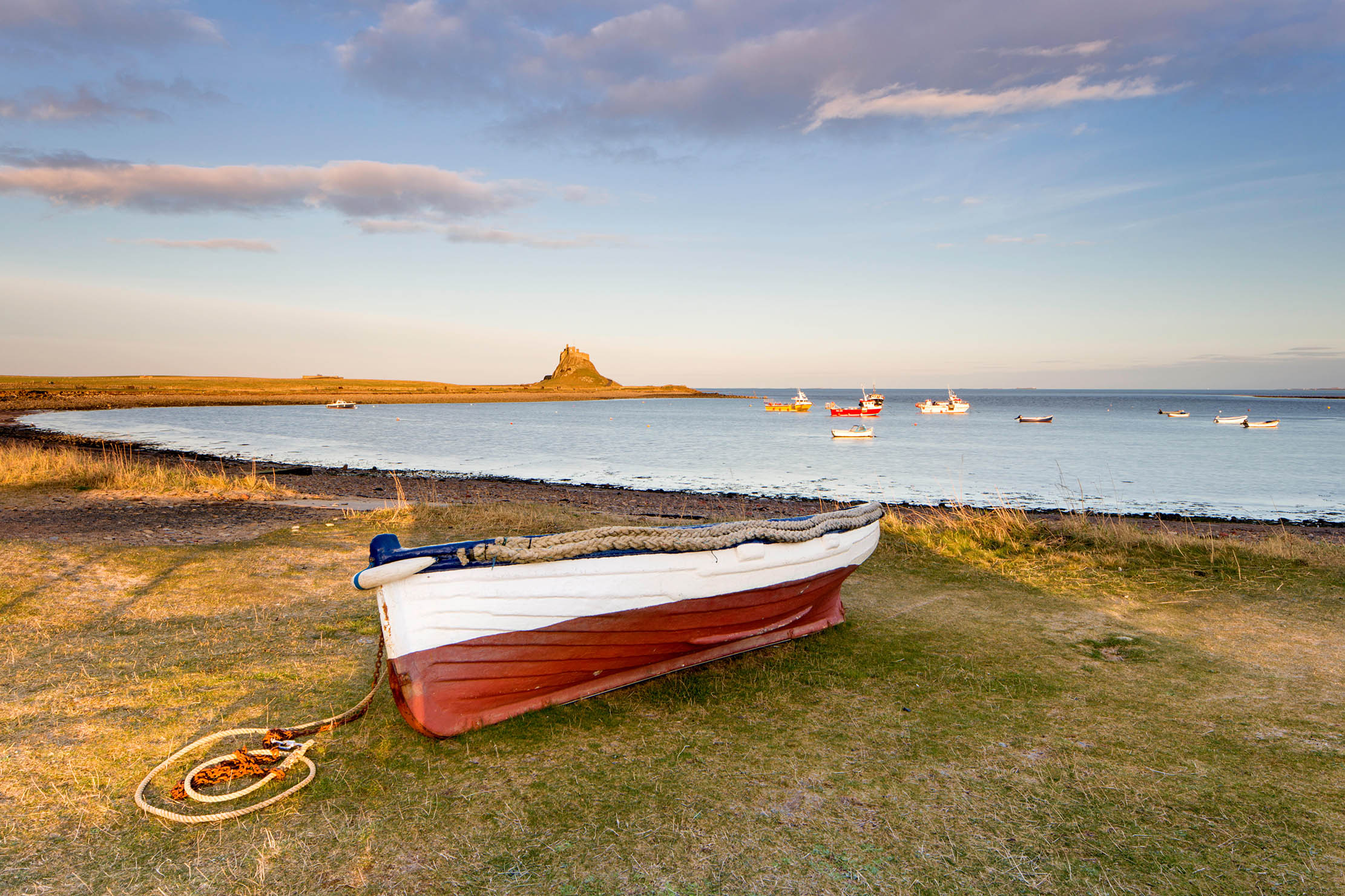 A traditional Northumbrian Coble: &#039;broad beamed, steeply raked, with a generous high freeboard to part the choppy waters without getting everyone wet&#039;.