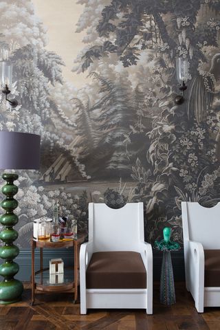 a grey mural wallpaper in a living room