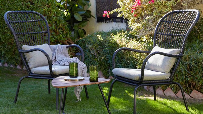 Patio furniture set: Belham Living Braylen All Weather Wicker Outdoor Chat Set on grass in garden