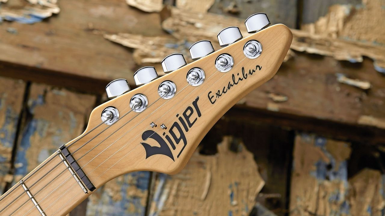 One of the numerous Vigier innovations is to use a chromed ball end, which you thread the string through, for a string tree