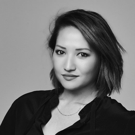 a woman with short hair in a black and white photo