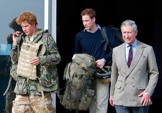 Prince Harry, carrying his rucksack and wearing a flak jacket, leaves the terminal building at RAF Brize Norton Prince William and Prince Charles after returning from Afghanistan where he spent 10 weeks on active duty on March 1, 2008 in Brize Norton, England