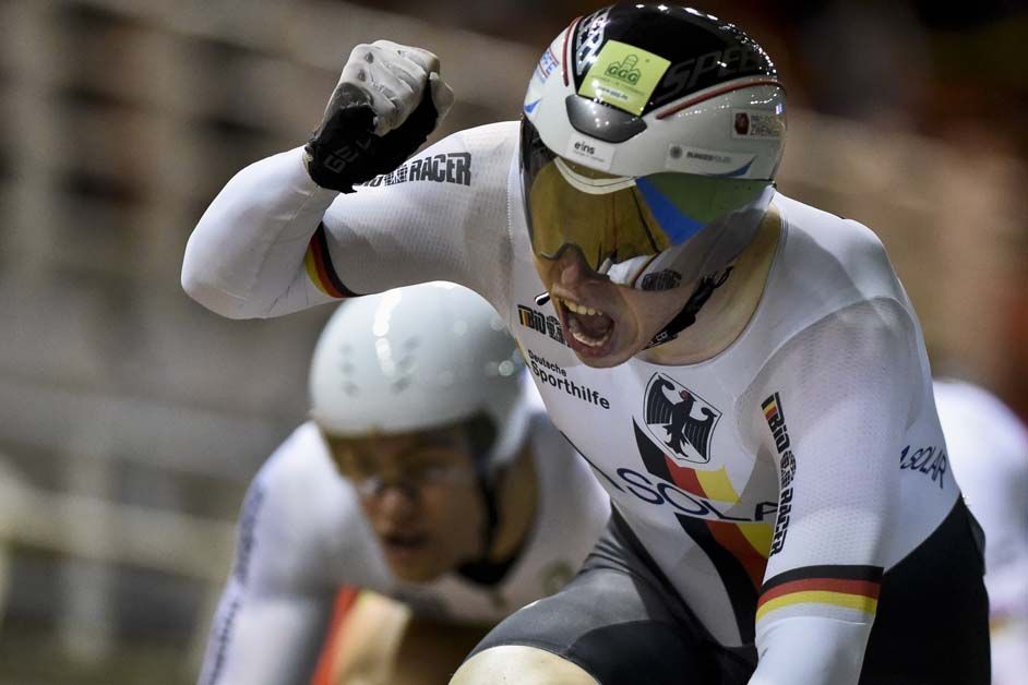 Joachim Eliers celebrates his gold medal