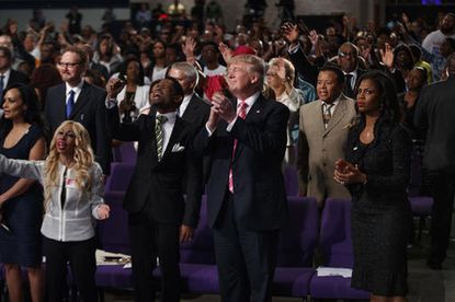 Donald Trump attends a church service in Detroit