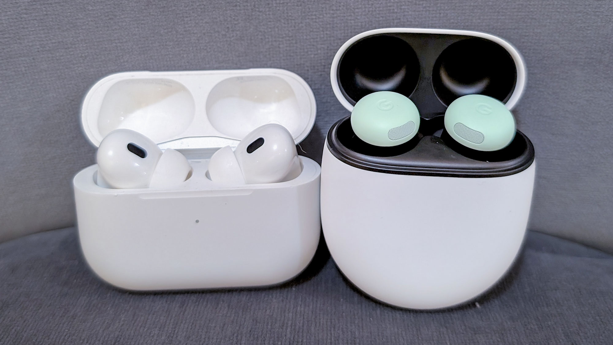 The AirPods Pro 2 vs. Google Pixel Buds Pro 2 next to one another.