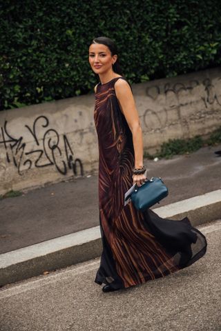 woman wearing brown dress