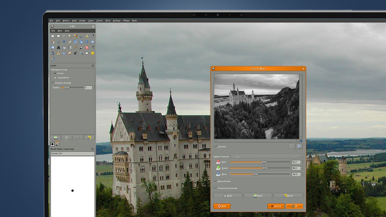 A laptop screen showing the GIMP photo editing software