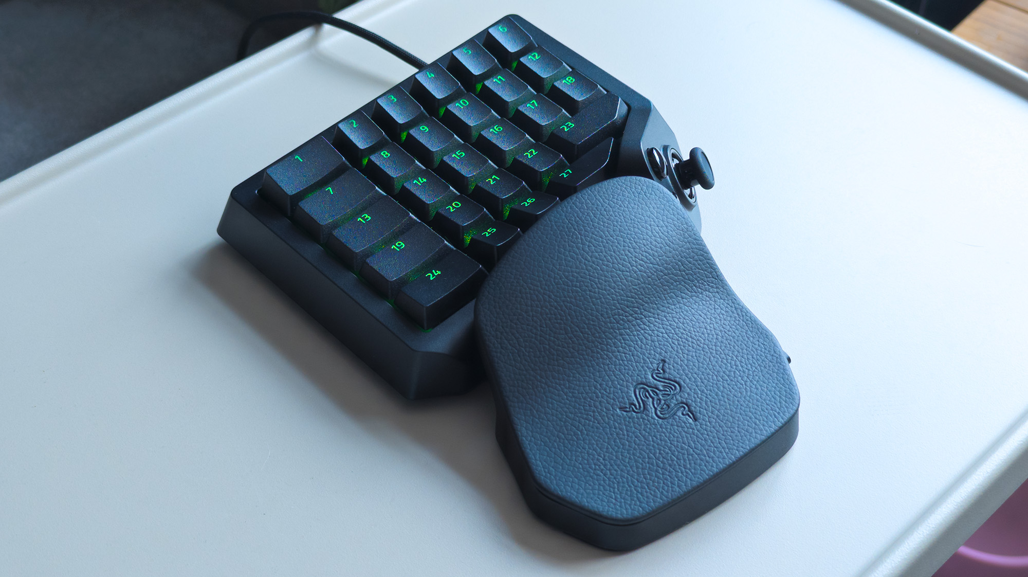 Razer Tartarus V2 Pro connected with cable to show illuminated green keys