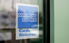 A sign showing the American Express logo is seen outside of a restaurant November 11, 2008 in Des Plaines, Illinois. American Express won federal approval to bec