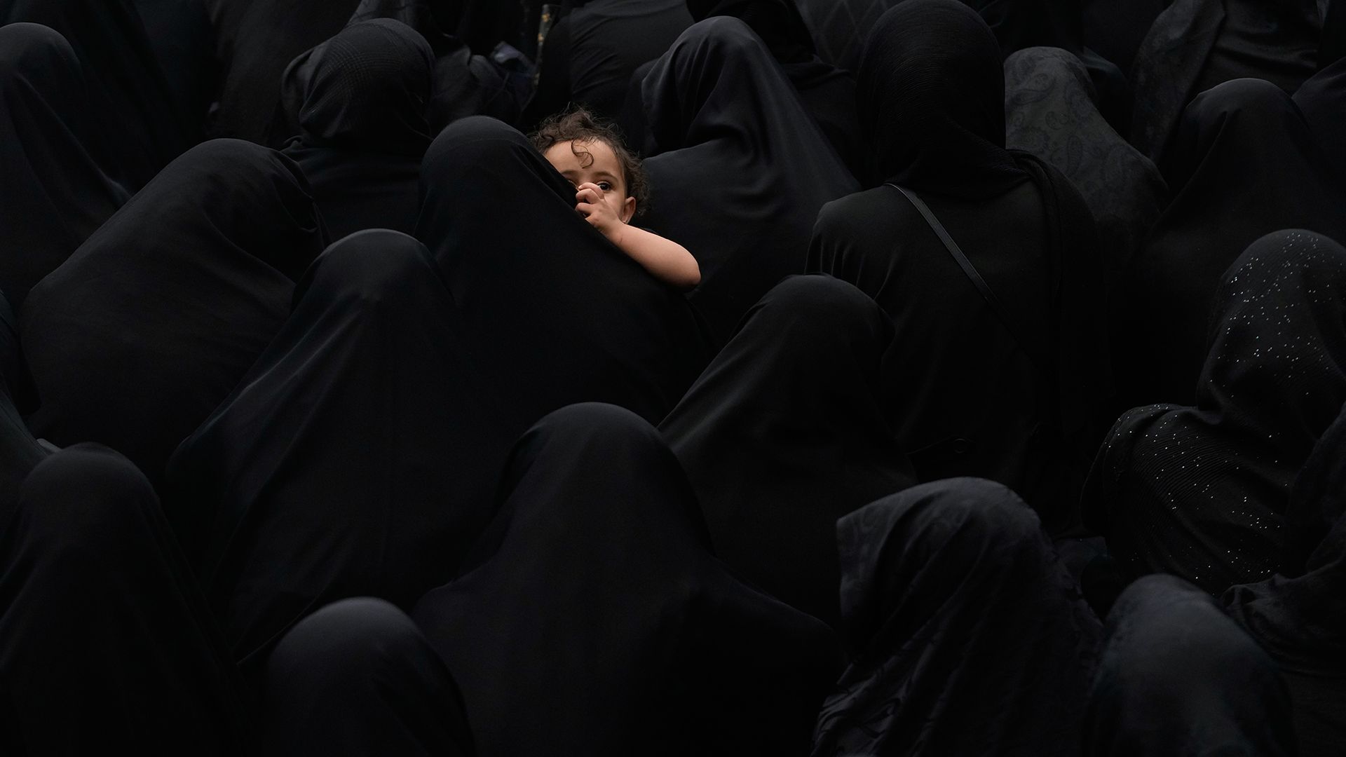 
                                Shiite Muslim women gather during a mourning ceremony as part of the Ashura day of commemoration in Tehran, Iran
                            