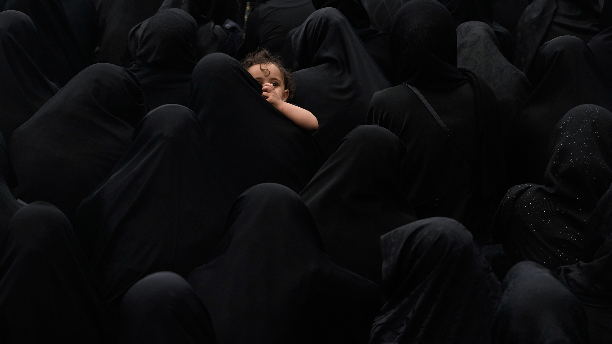 Shiite Muslim women gather during a mourning ceremony as part of the Ashura day of commemoration in Tehran, Iran