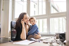 mum with baby son in office at work