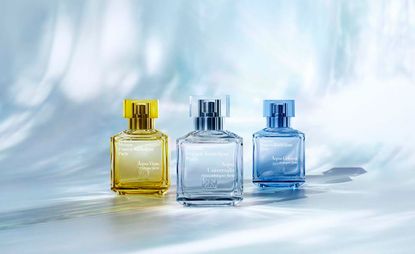 Maison Francis Kurkdjian three new bottles of Aqua Cologne Forte in yellow and blue glass bottles 