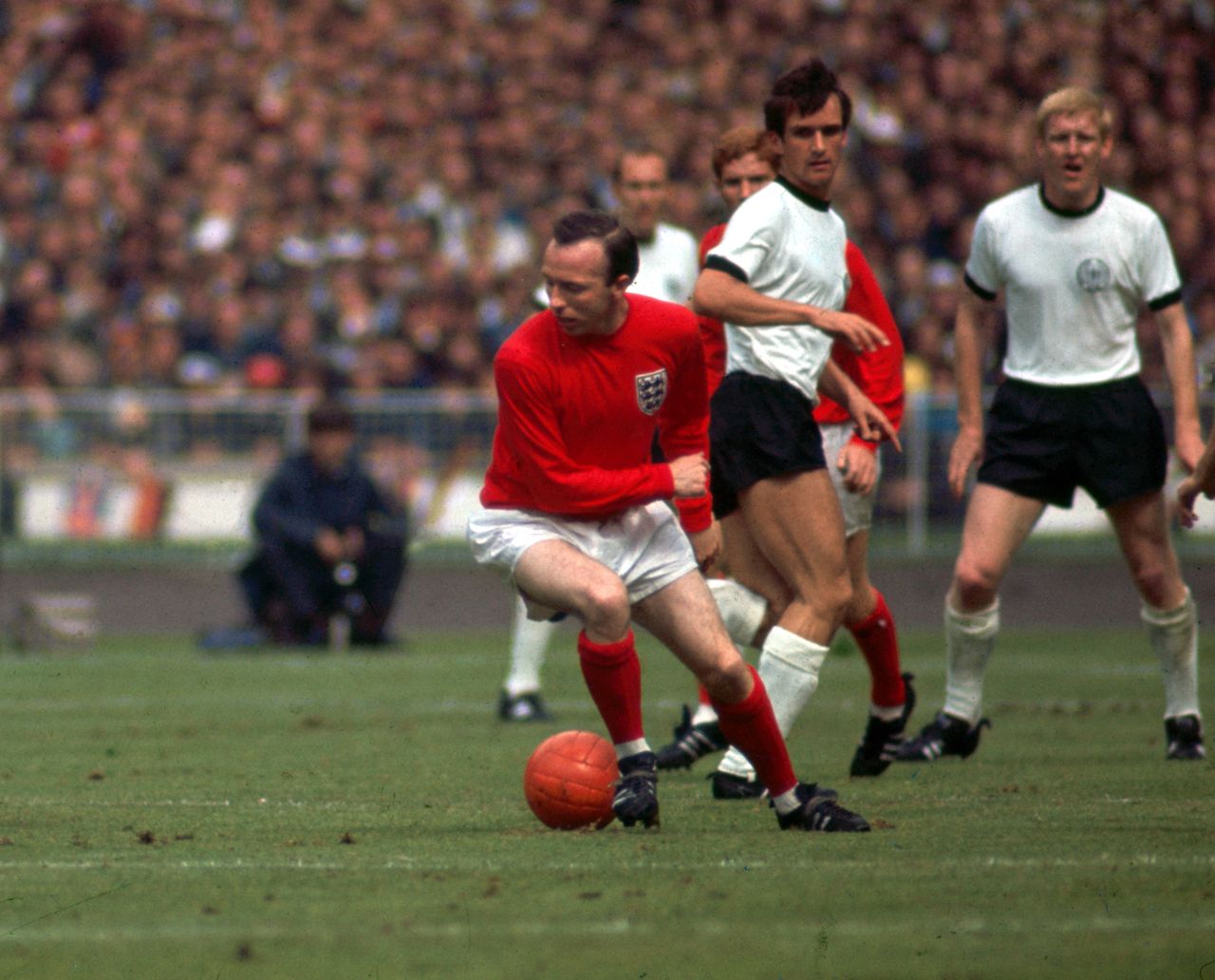 Nobby Stiles in action for England against West Germany during the 1966 World Cup final at Wembley Stadium