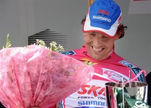 Kenny Van Hummel (Skil - Shimano) collects his flowers and trophy. Photo &copy;: AFP Photo