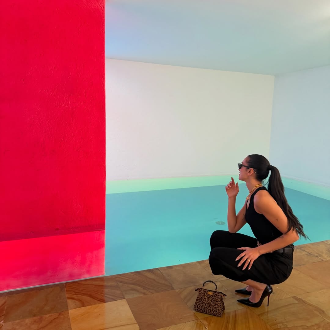 Dua Lipa modeling her animal-print Fendi Peekaboo ISeeU Petite bag