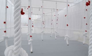 white ropes with red flowers