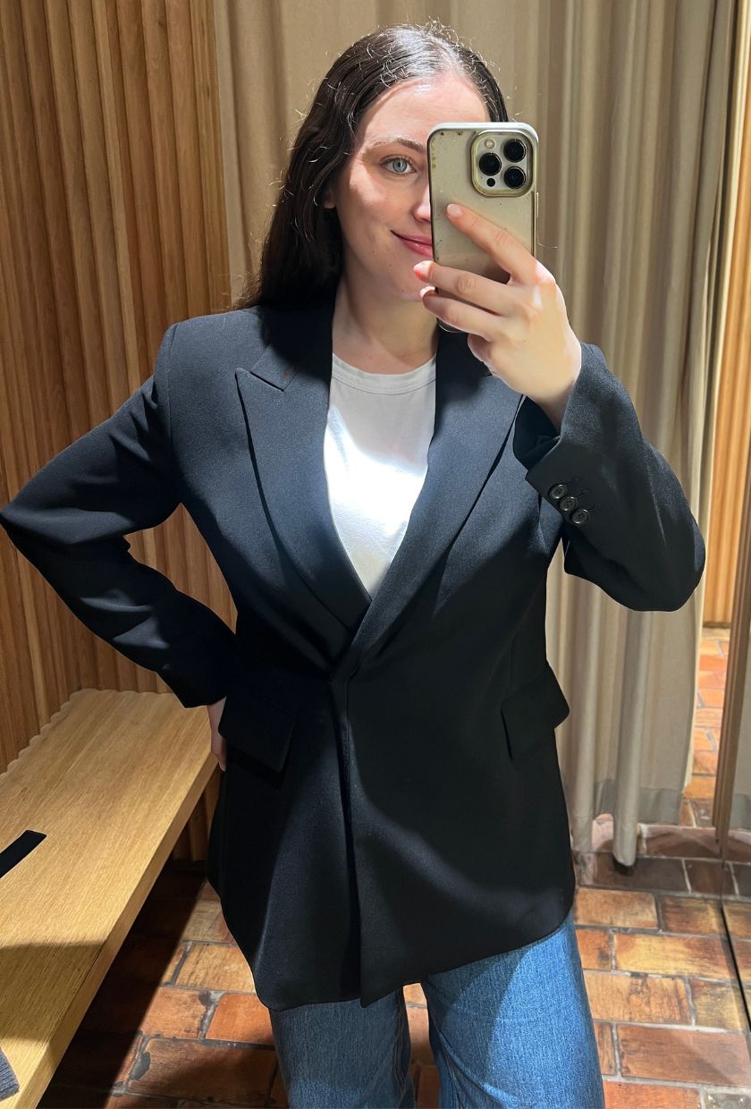 An image of @avahgilchrist trying on a Mango blazer.