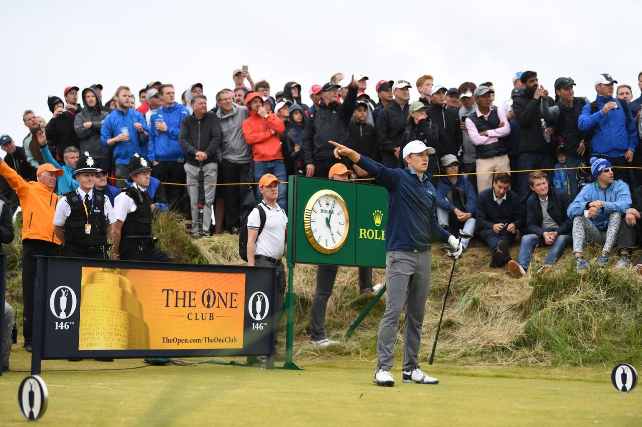 Jordan Spieth points right after hitting a wayward drive at the 2017 Open
