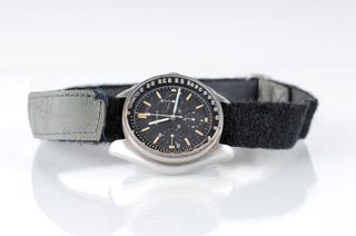 Apollo 15 commander David Scott's moon-worn Bulova watch sold for a record $1.625 million at auction.