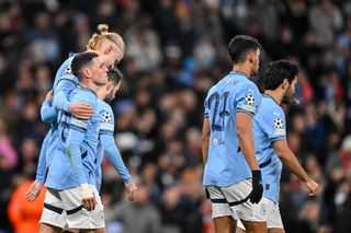 Phil Foden of Manchester City, Erling Haaland of Manchester City, Matheus Nunes of Manchester City and Ilkay Guendogan of Manchester City gestures, looks dejected during the UEFA Champions League 2024/25 League Phase MD5 match between Manchester City and Feyenoord at Etihad Stadium on November 26, 2024 in Manchester, England.