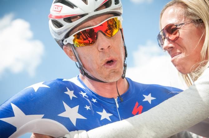 Todd Wells (Specialized) and his wife showing a little expression that he had a hard day at the office.